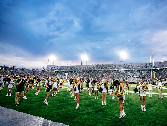 Cheerleaders on the UAB football field
