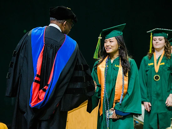 Student receives diploma